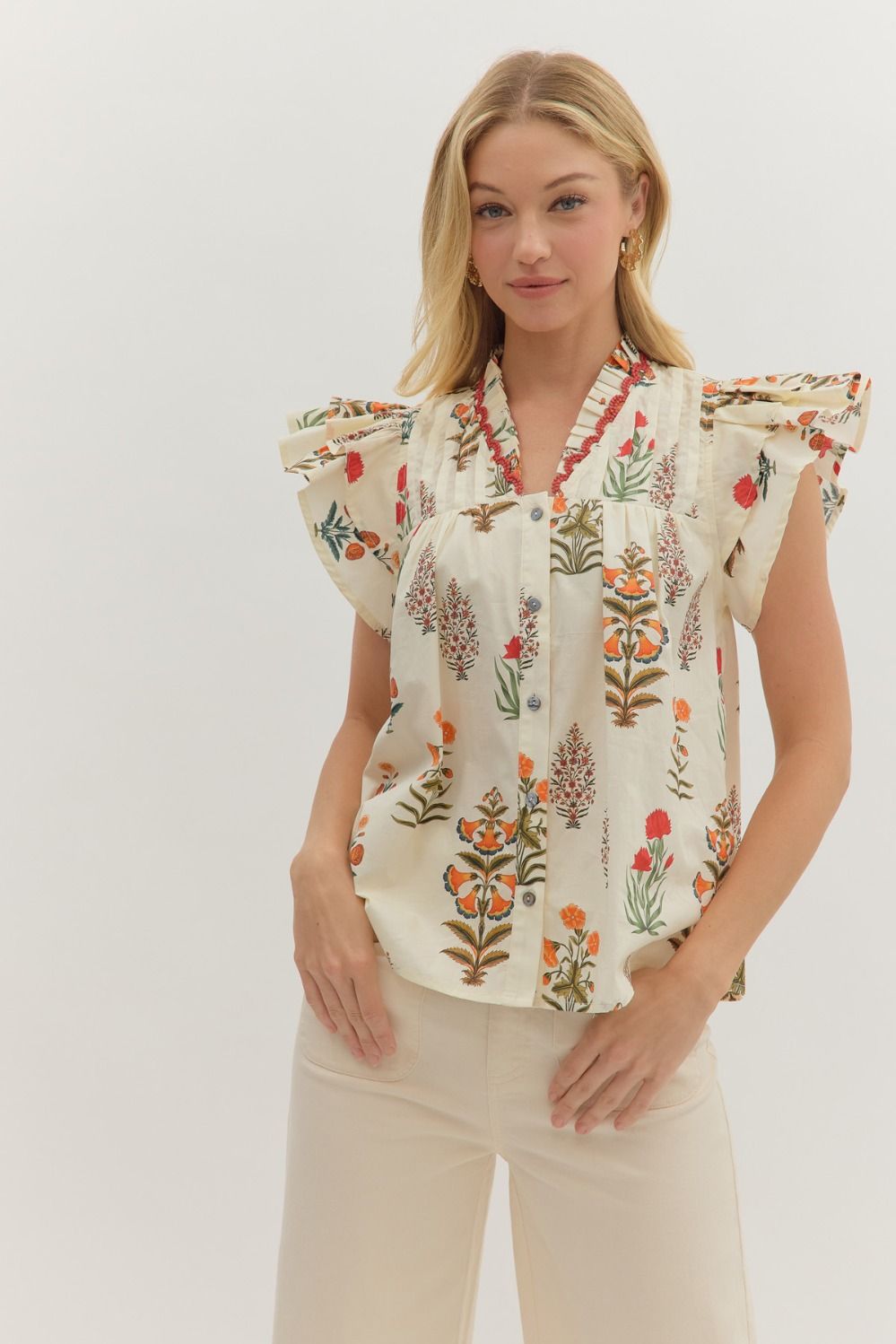 Botanical print short flutter sleeve top featuring pintuck bodice