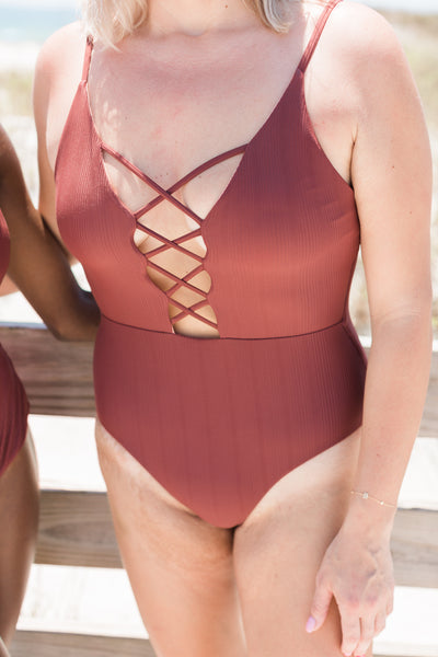 Brown criss cross one piece bathing suit
