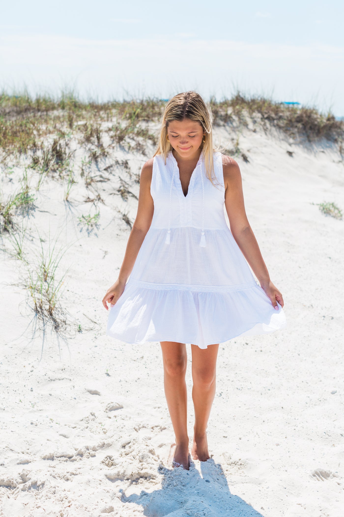 Sleeveless White gauze dress with Tassels