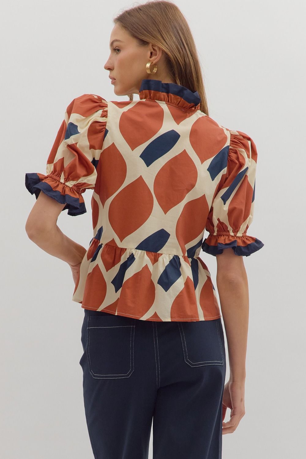 Abstract Print Peplum Top with Contrast Ruffle Trim along V-Neck